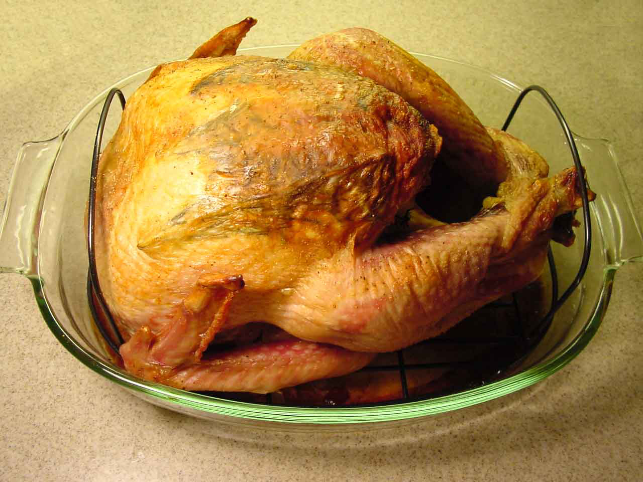 Golden brown turkey cooked uncovered using this recipe.